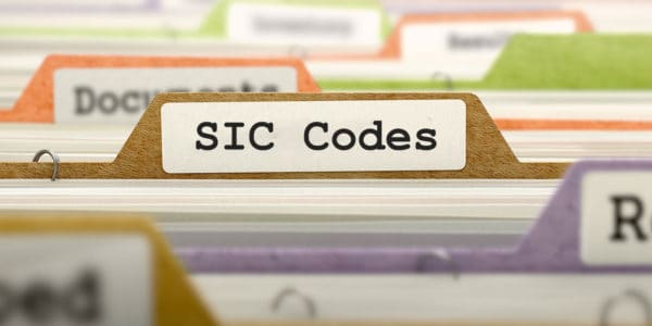 Row of file dividers with tabs, one of which is labelled "SIC Codes".