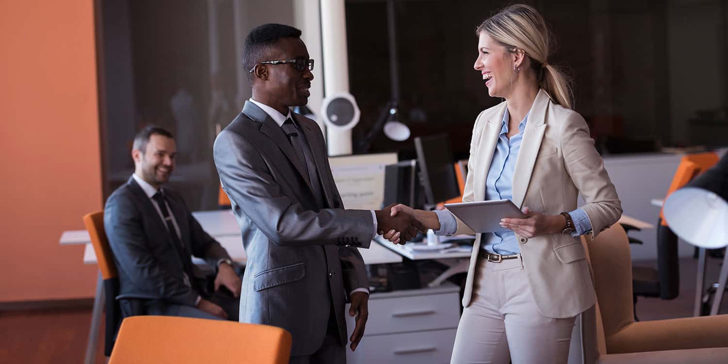 A business person meeting a business bank manager.