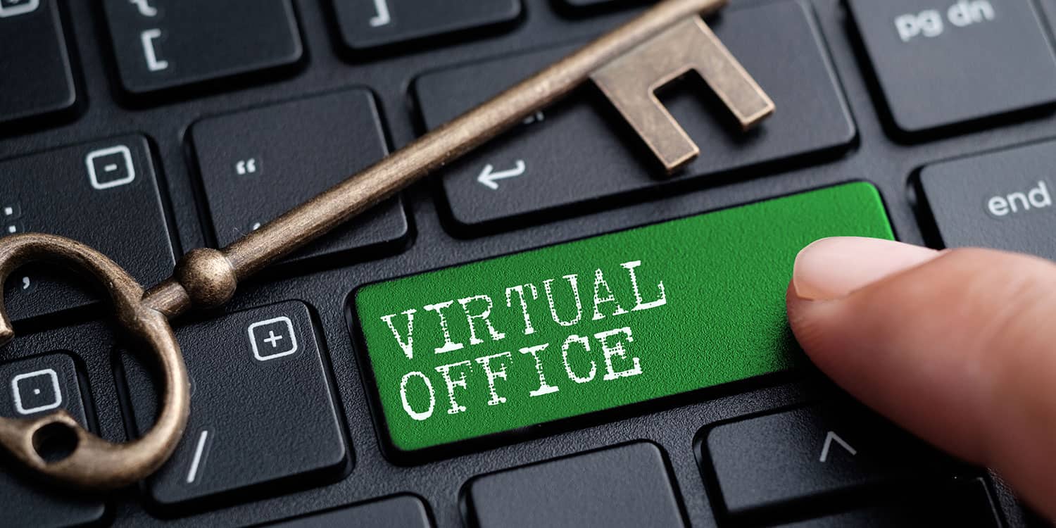 Close-up on a computer keyboard with the words "Virtual Office" featured on one of the keys.