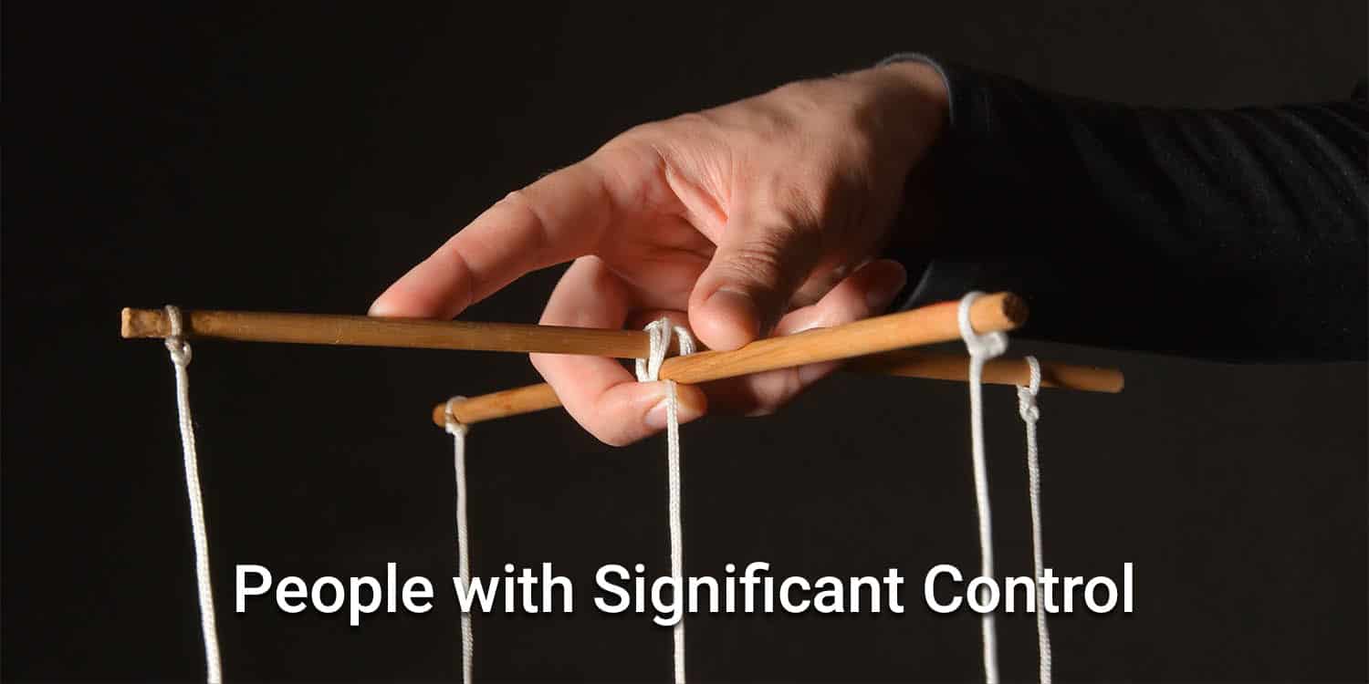 A hand holding puppet controls with the headline 'People with Significant Control'.