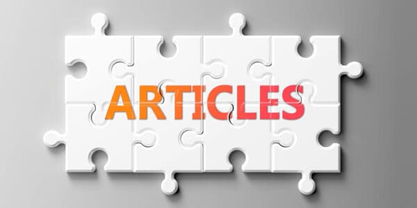 The word ARTICLES on a jigsaw puzzle pieces.