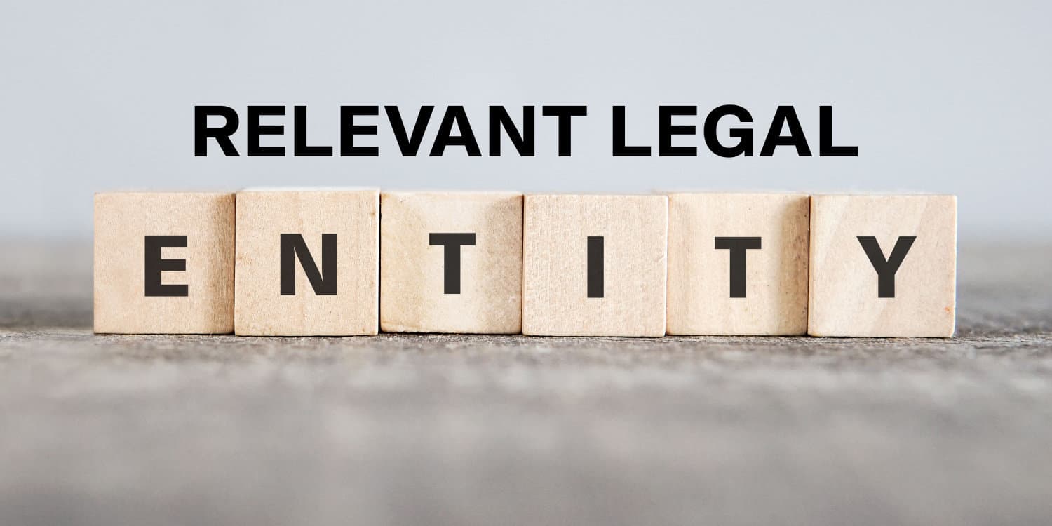 Headline of ELEVANT LEGAL sitting above a row of 6 wooden blocks displaying the word ENTITY.