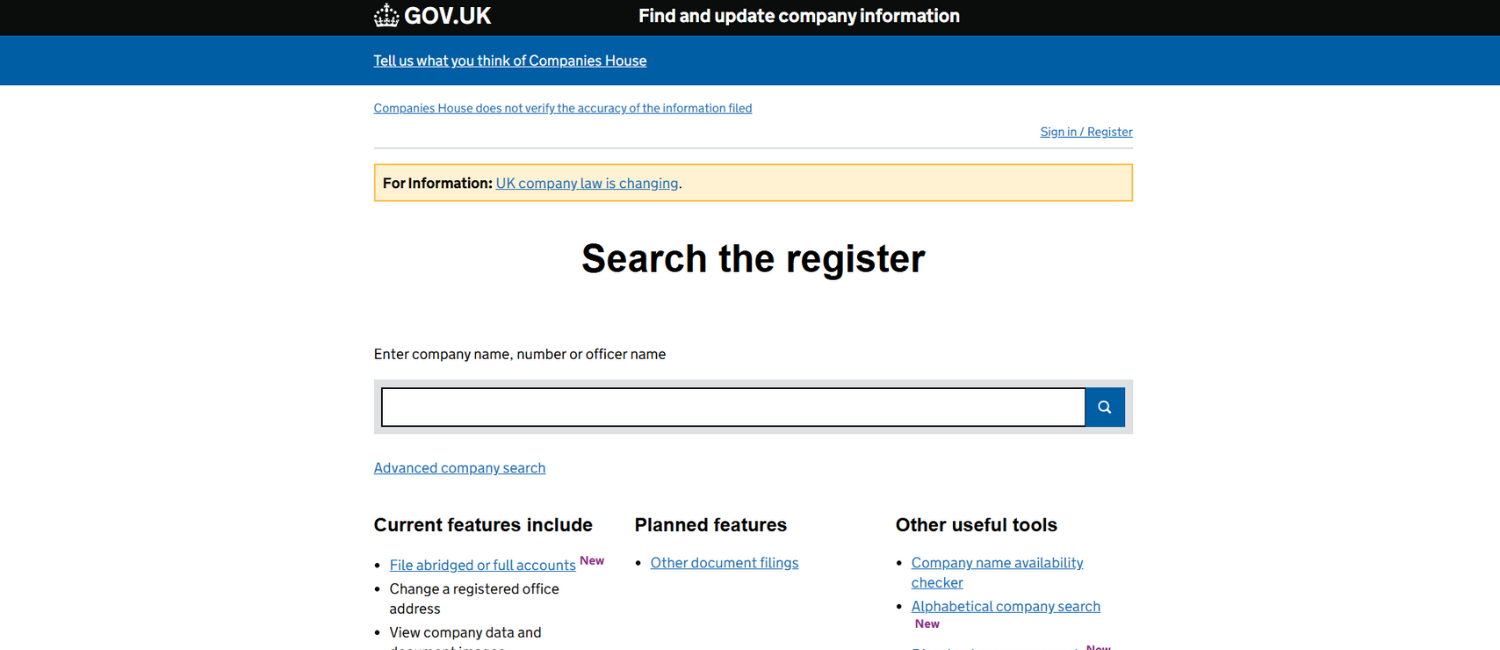Screenshot of the Companies House 'Search the register' page on the GOV.UK website, showing a search bar for entering a company name, number, or officer name, with links to features like changing a registered address, company name availability checker, and alerts about changes to UK company law