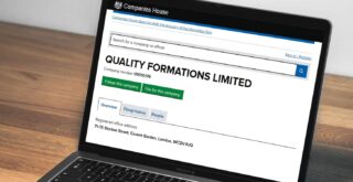 Image of a laptop displaying Quality Company Formations' listing on the Companies House Service website, which is one of the locations where you can find your Company Registration Number.